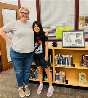 Ms. Moore with student